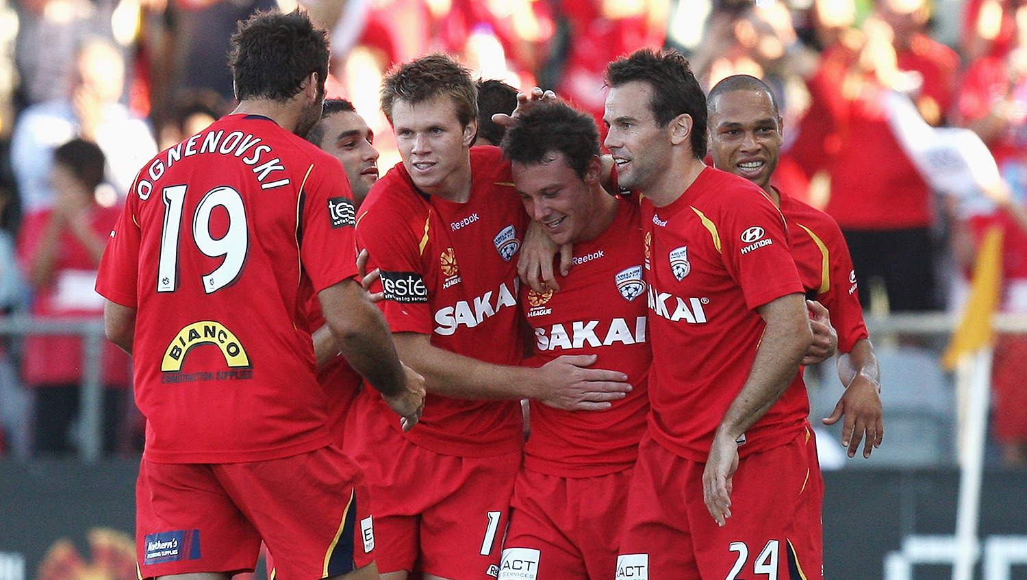 The Reds celebrate Fabian Barbiero's goal vs Brisbane in 2009