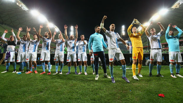 Melbourne City players celebrate their win over Perth Glory at AAMI Park on Sunday.