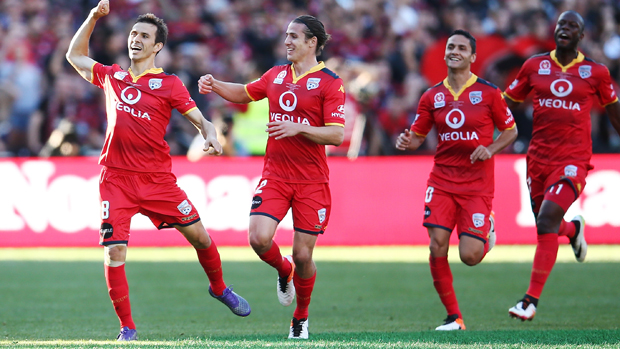 Isaias celebrates with teammates after scoring a stunning goal in the Hyundai A-League Grand Final.