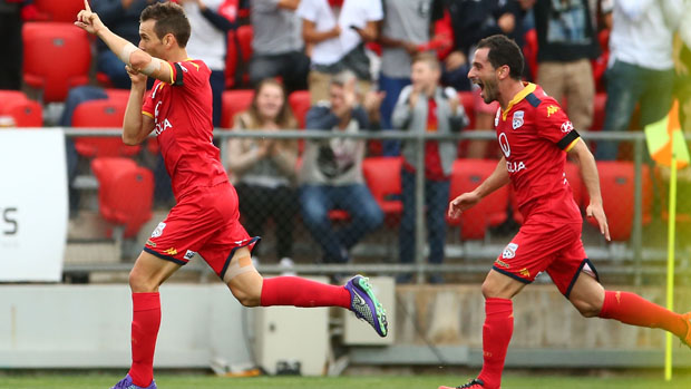 Isaias celebrates after scoring in Adelaide's 4-2 win over Central Coast Mariners.