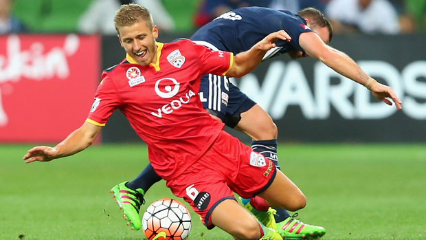 Adelaide United's Stefan Mauk in action against Melbourne Victory.