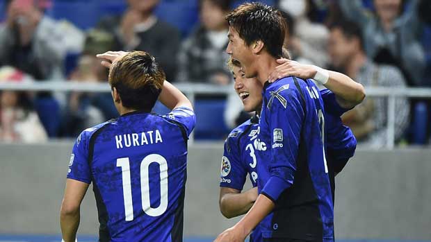 Gamba Osaka players celebrate a goal  in their win over Adelaide United in the ACL on Tuesday night.