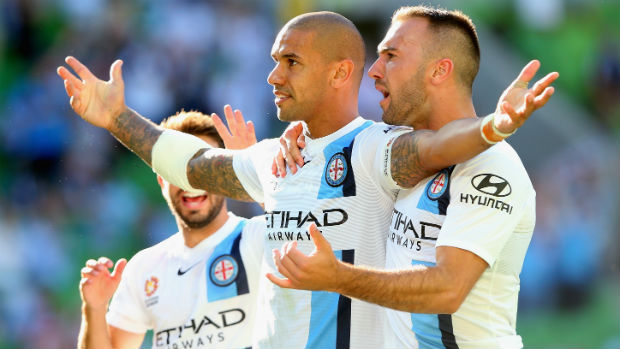 City captain Patrick Kisnorbo celebrates his headed goal against the Mariners.