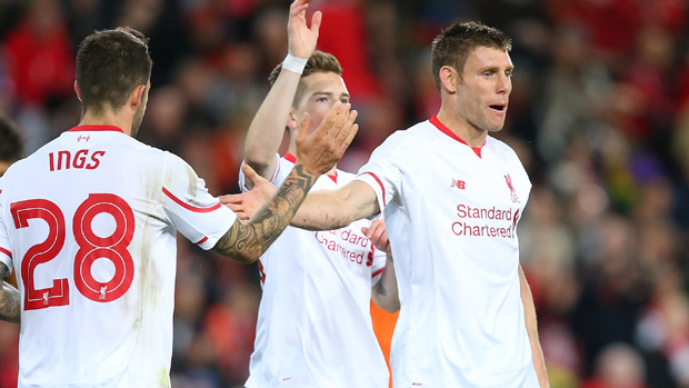Liverpool players celebrate a goal during their 2-1 win over Brisbane Roar.