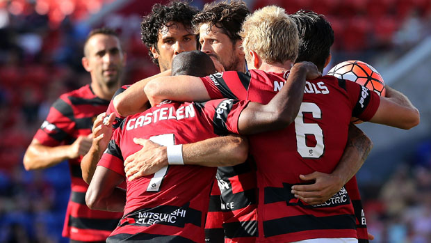 Wanderers players celebrate Jaushua Sotirio's first-half strike against the Jets.