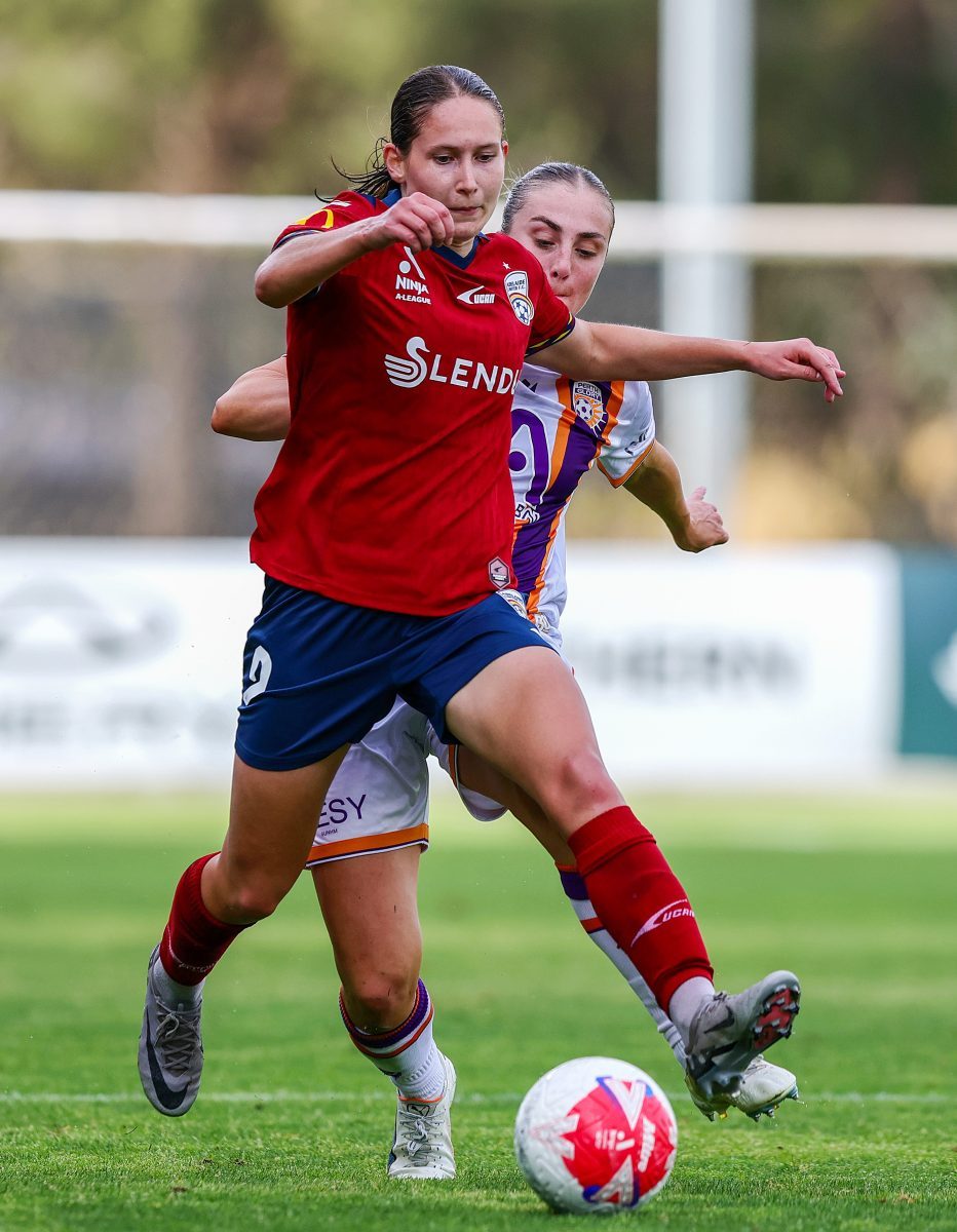 Kiera Meyers of Adelaide United and Ella Buchanan of Perth Glory at Service FM Stadium.