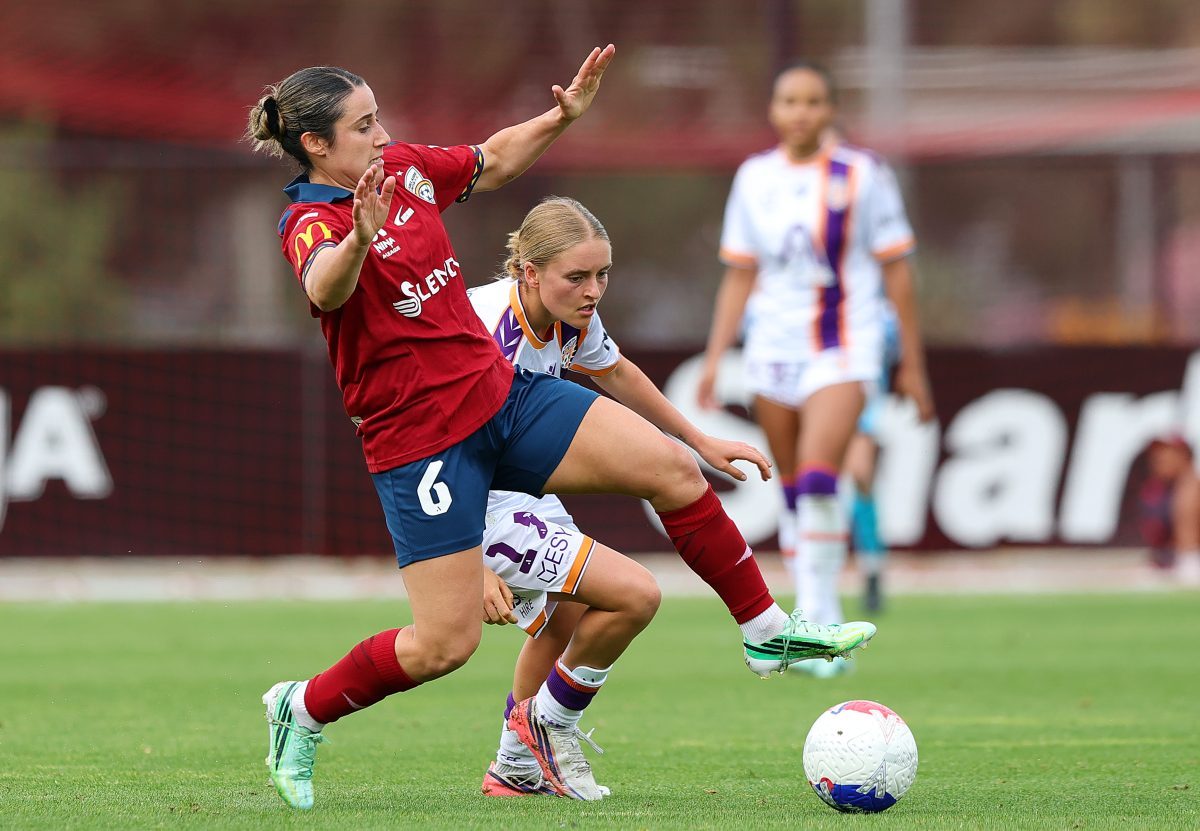 Melissa Taranto of Adelaide United and Clancy Westaway of Perth Glory at Service FM Stadium.