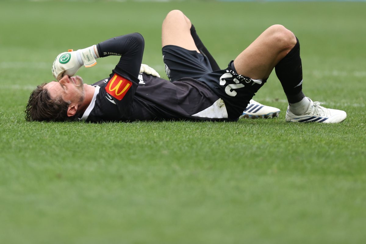 Joshua Smits of Adelaide United looks dejected after the match at Allianz Stadium.